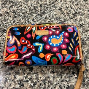 Black Consuela brand women's wallet with bright colors.
